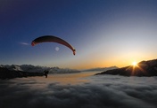 Fly like a bird above the clouds