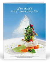 Page titre du livre de cuisine nouvellement paru, réalisé par 29 cuisiniers de pointe de Zermatt. .