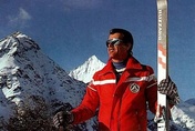 Peter Kronig, ski instructor since 1957, with skis preceding the carving era